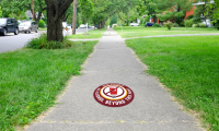 The DORA boundaries are proposed to be marked with sidewalk graphics to mitigate the visual pollution caused by additional signs at each intersection.