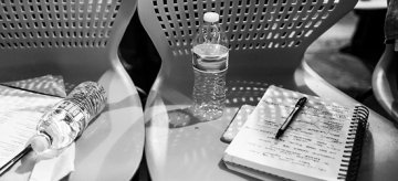 Photo of Chairs and Notebooks